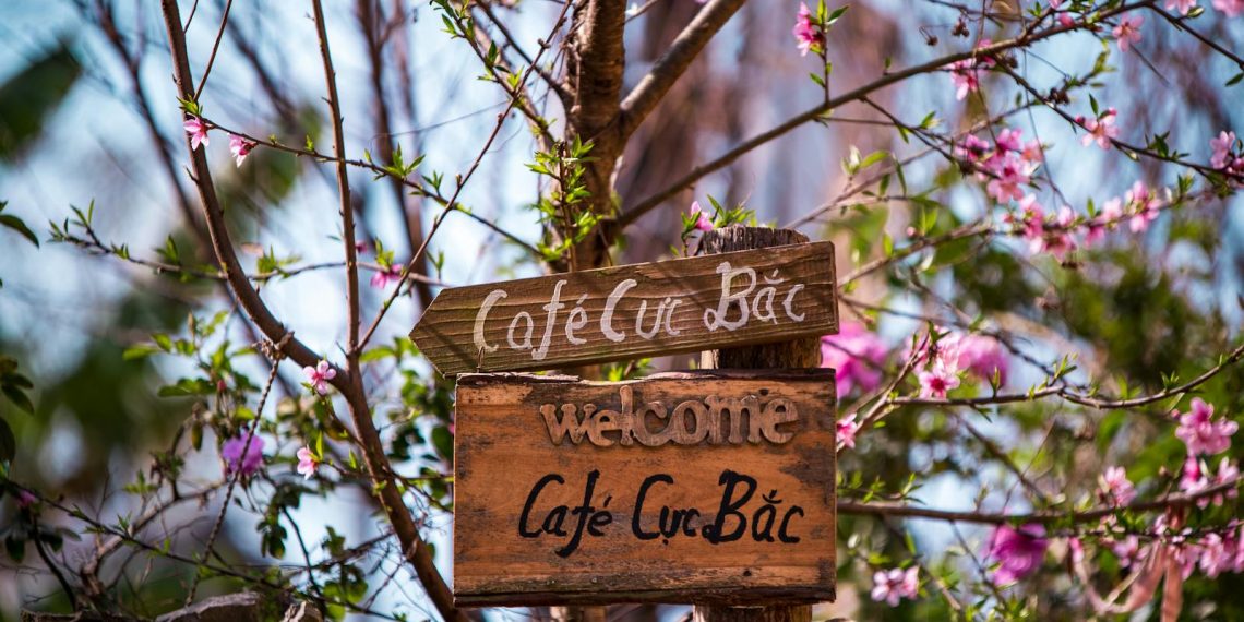 Wooden Guide Sign to Cafe Cuc Bac