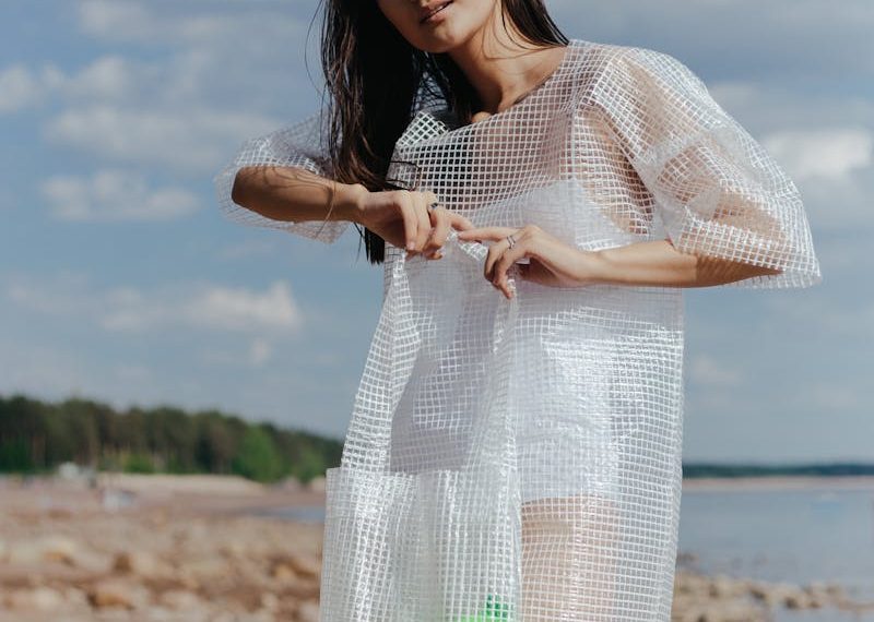 A Woman Wearing a White Plastic Dress